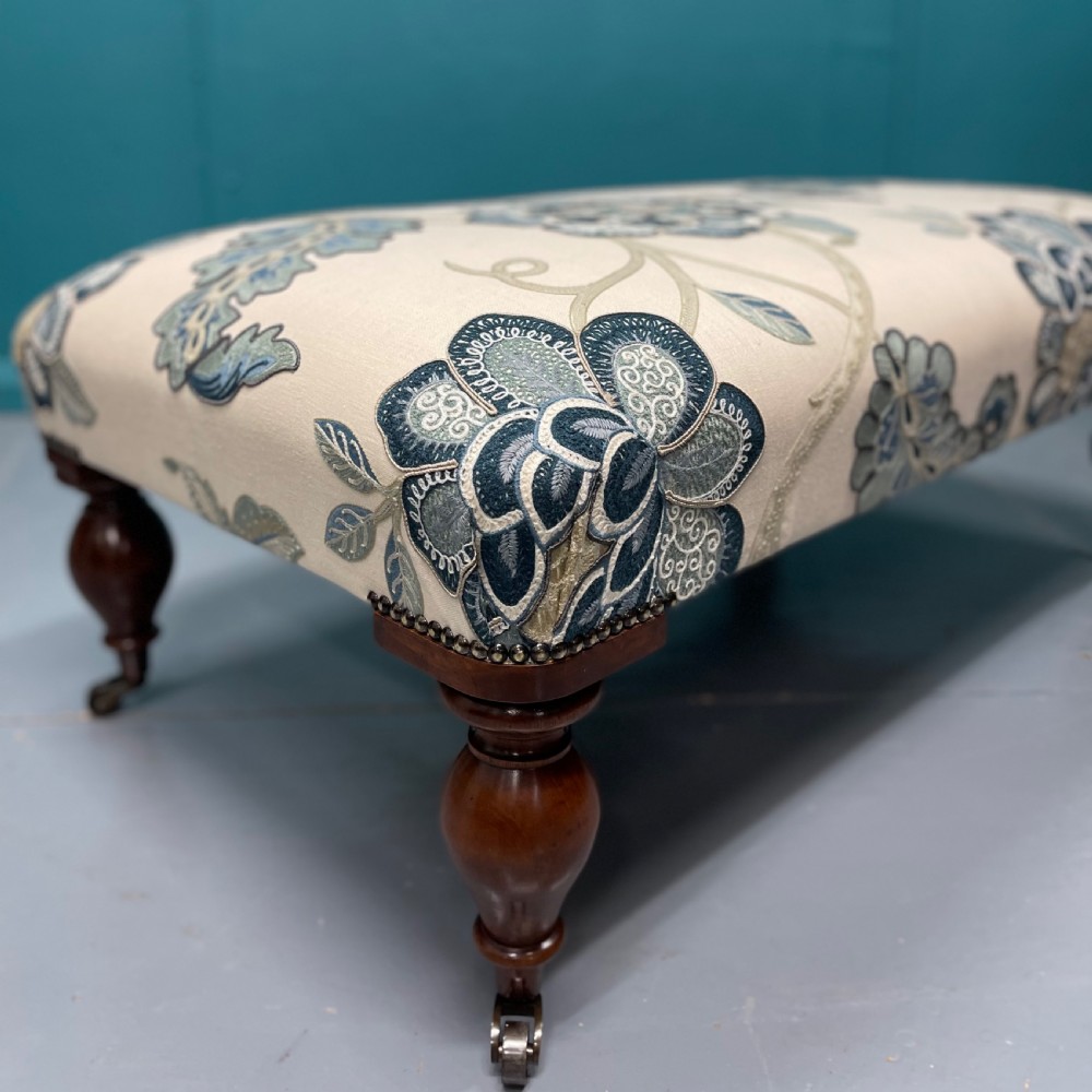 Newly upholstered ottoman footstool on bulbous legs View V