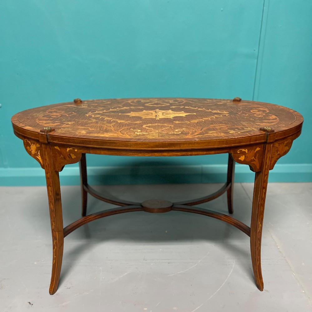 Oval marquetry coffee table by Greenwood & Sons