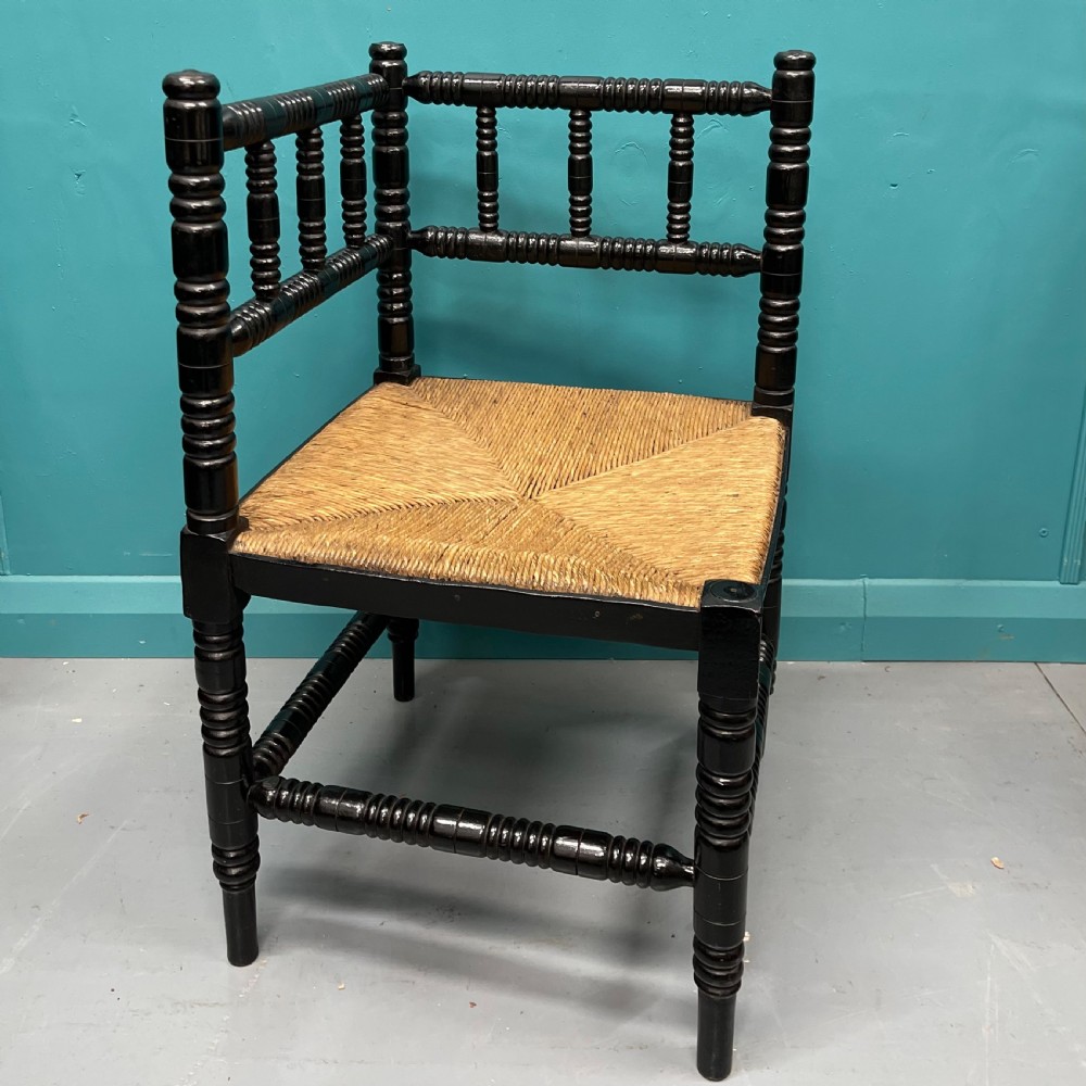 Black lacquered bobbin turned corner chair View II