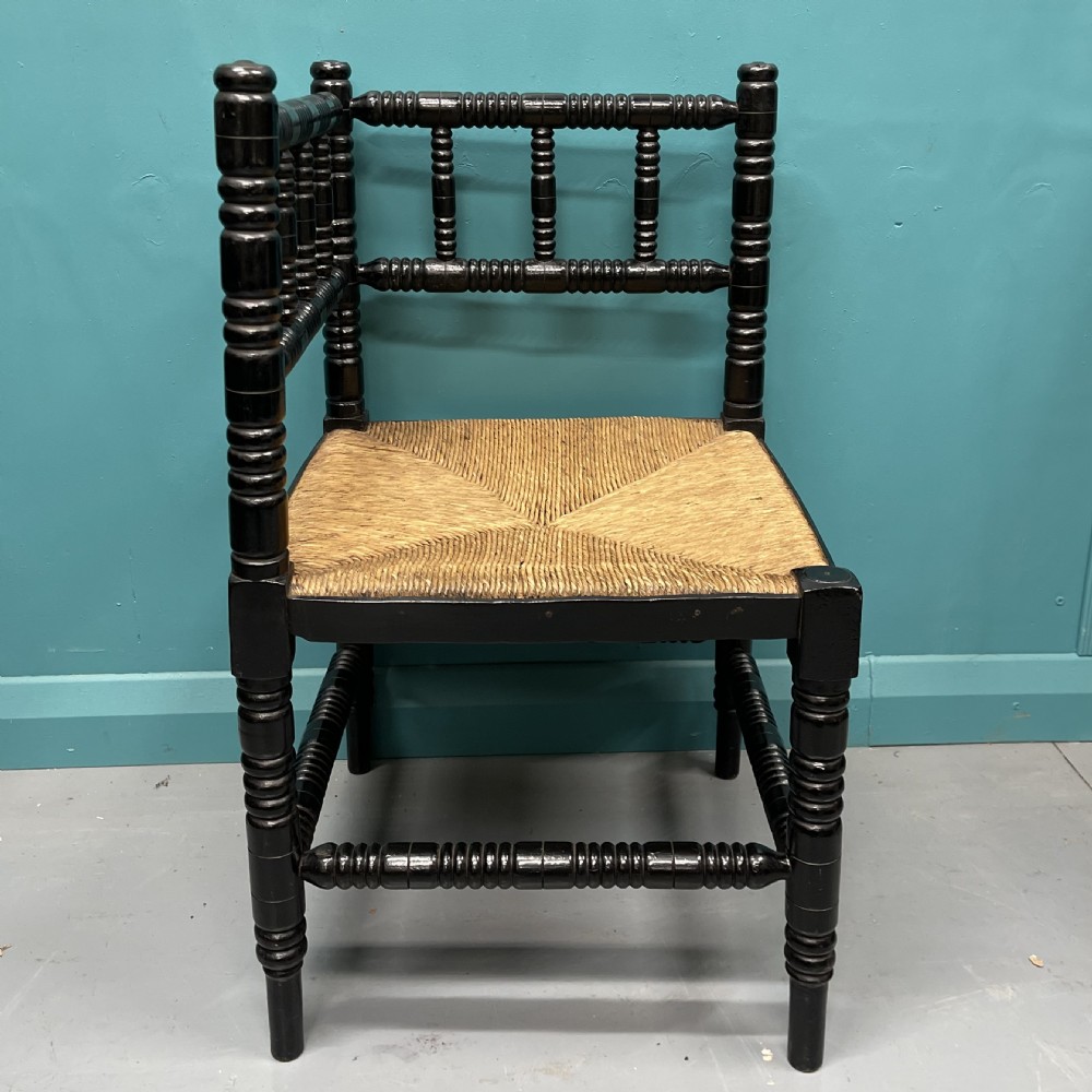 Black lacquered bobbin turned corner chair View IV