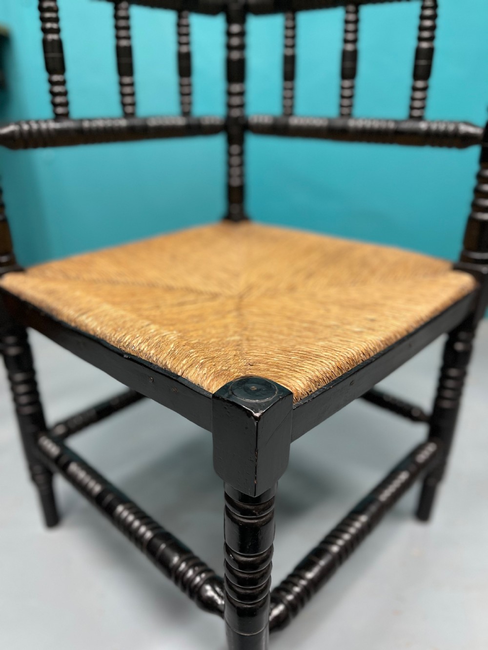 Black lacquered bobbin turned corner chair View V