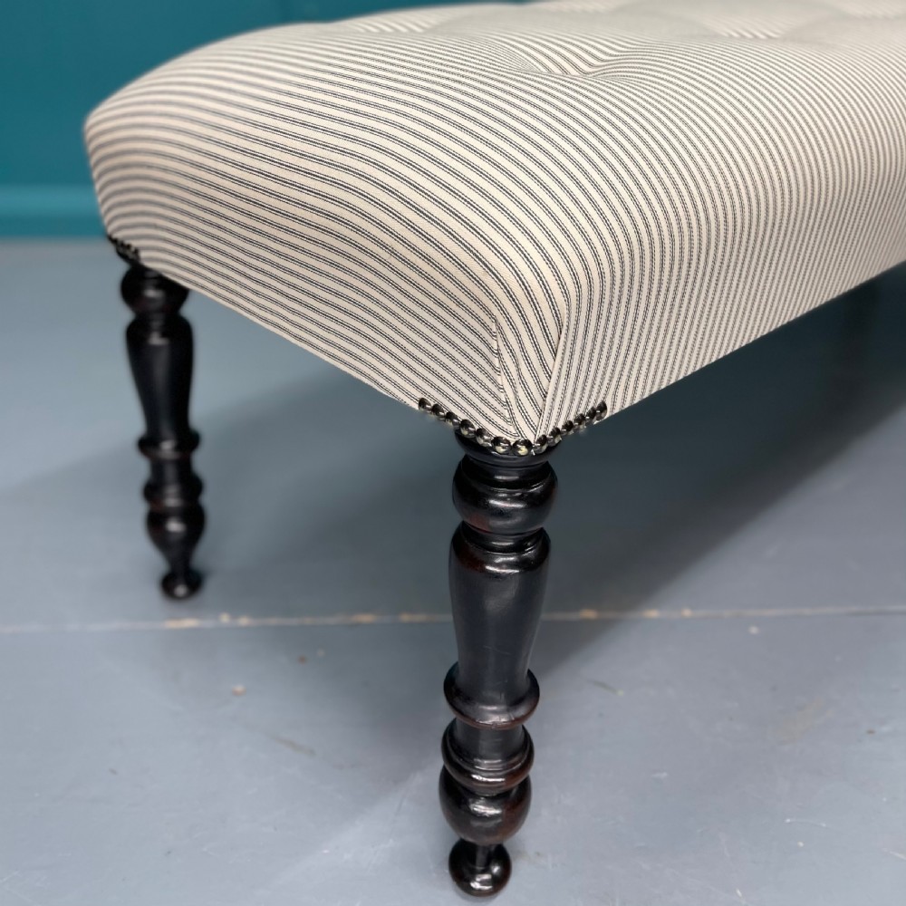 Victorian buttoned long stool on ebonised legs View III