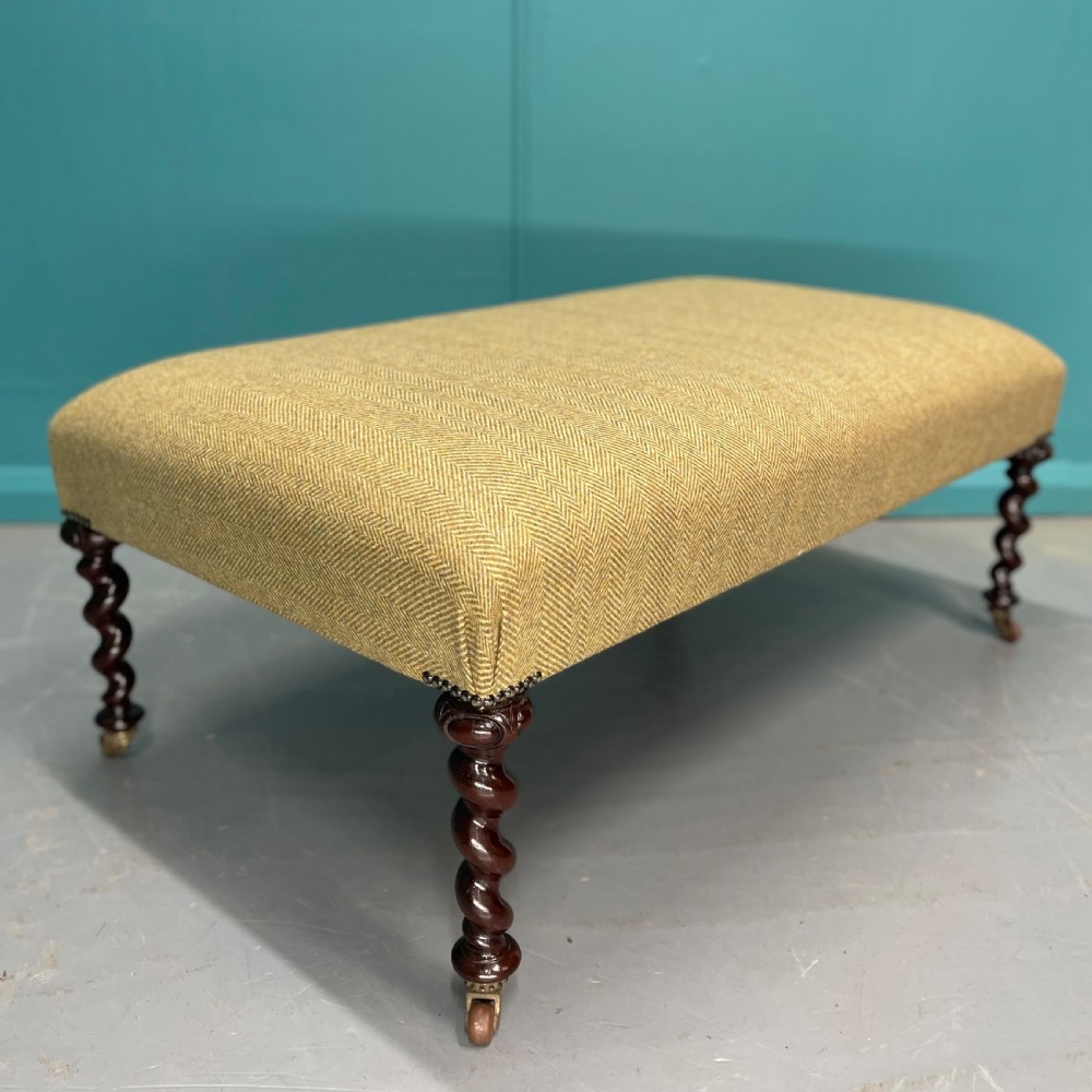 Newly upholstered tweed ottoman with barley twists View II