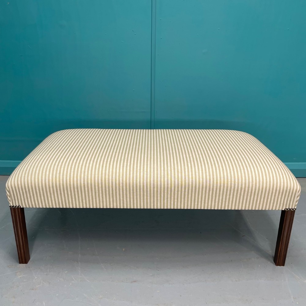 Newly upholstered olive stripe ottoman footstool