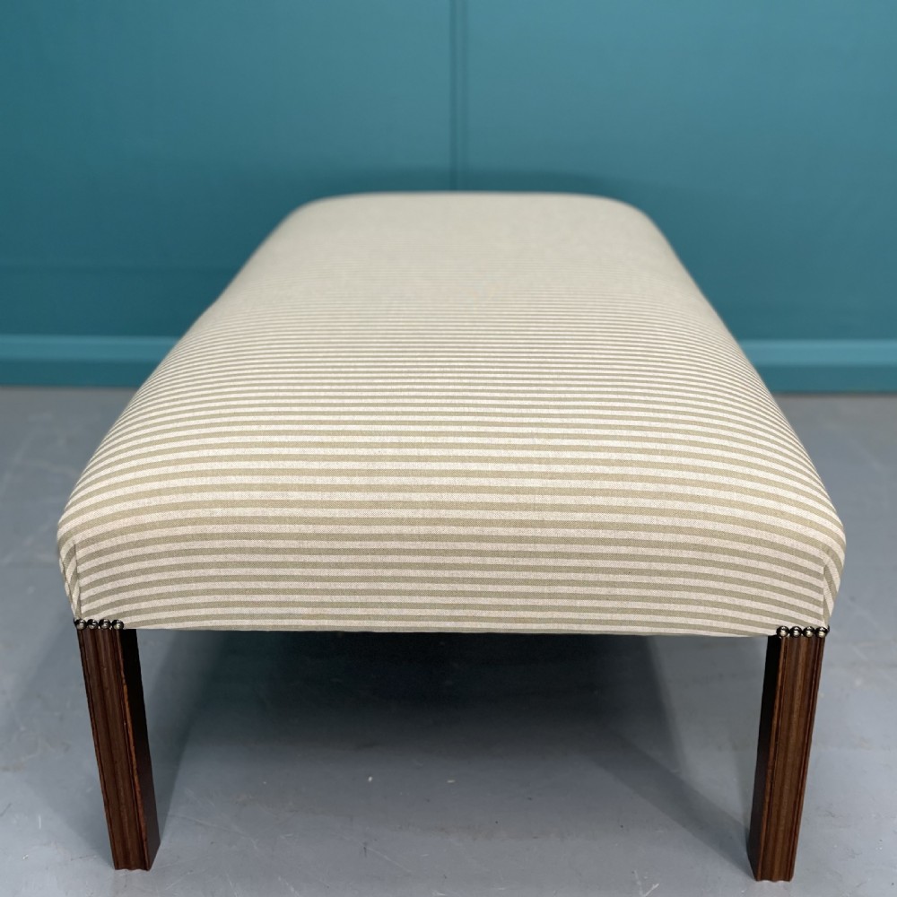 Newly upholstered olive stripe ottoman footstool View III