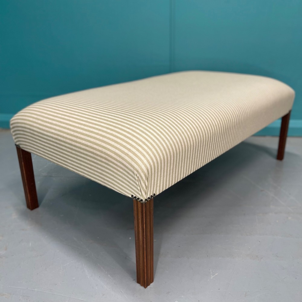 Newly upholstered olive stripe ottoman footstool View V
