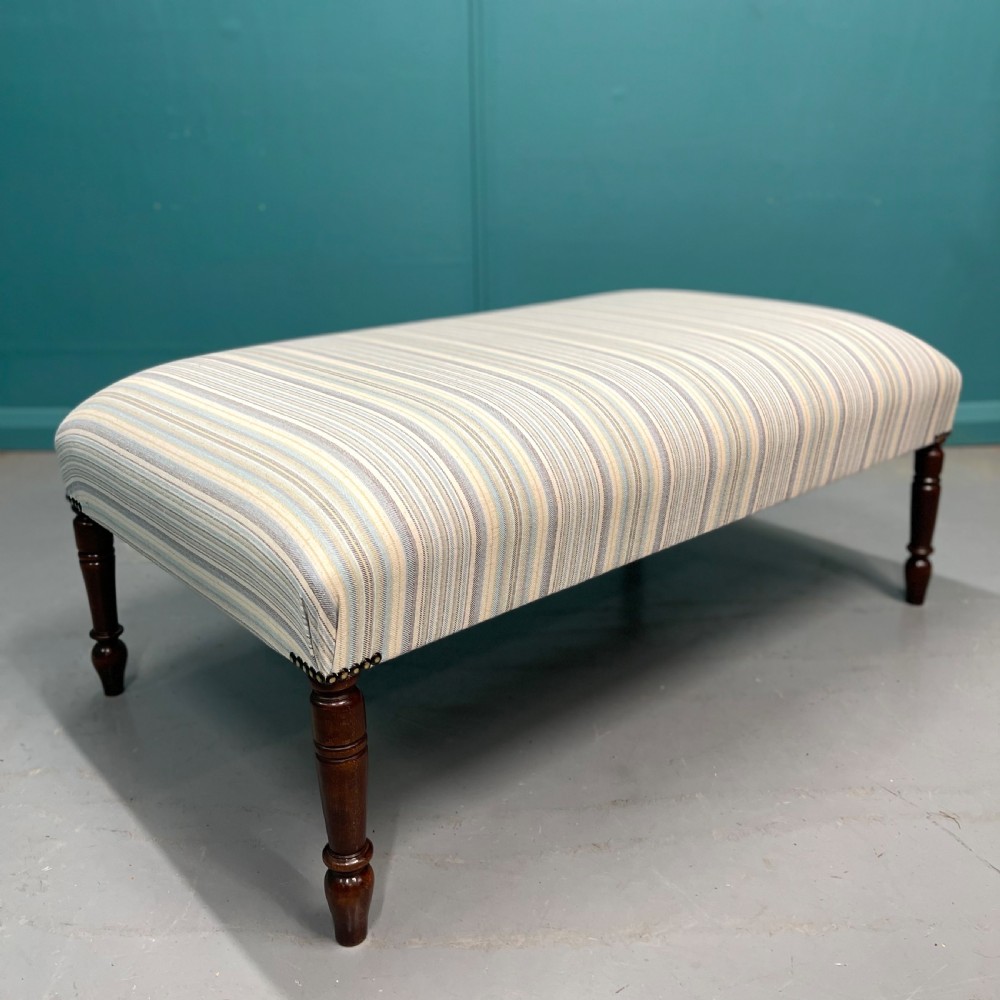 Newly upholstered pastel stripe ottoman stool View II