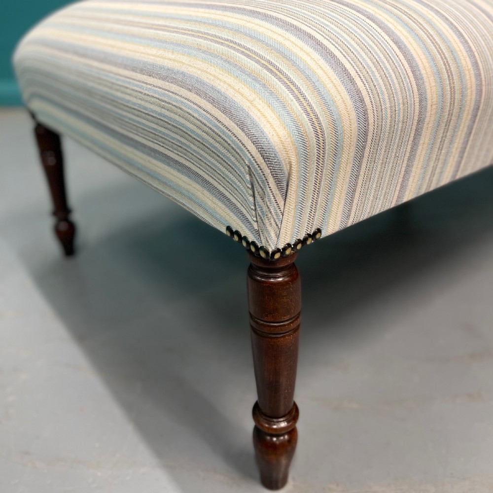 Newly upholstered pastel stripe ottoman stool View III