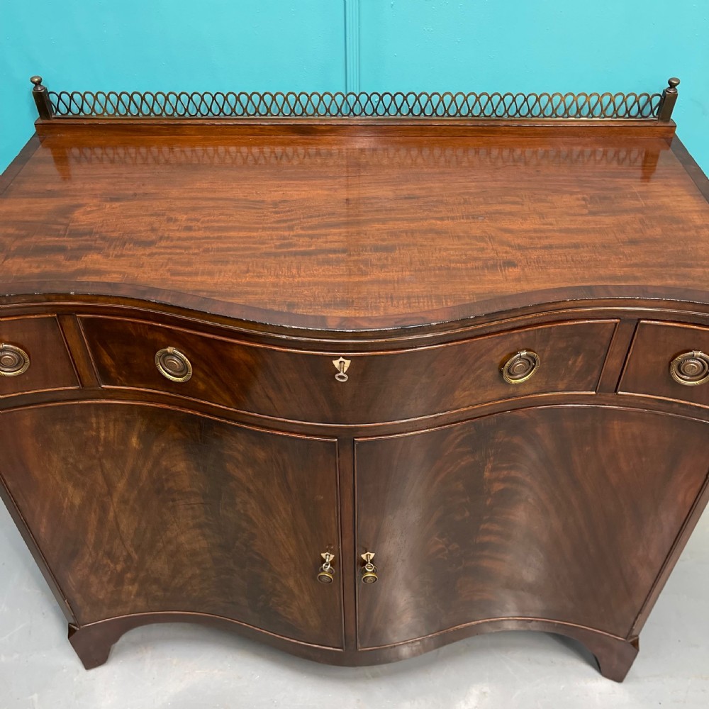Serpentine mahogany server sideboard with brass gallery View III