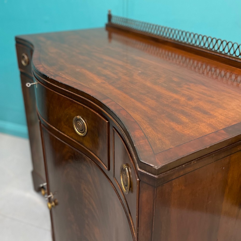 Serpentine mahogany server sideboard with brass gallery View IV