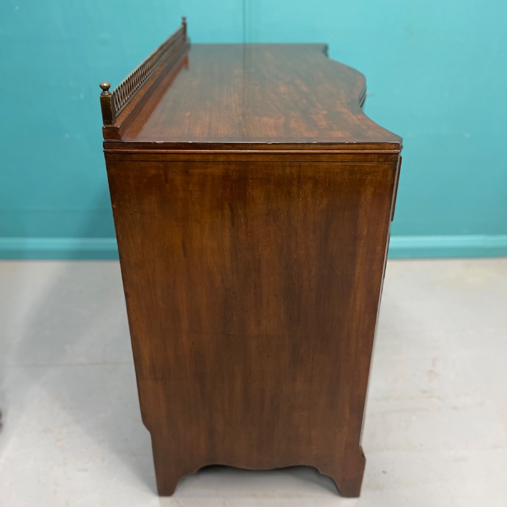 Serpentine mahogany server sideboard with brass gallery View IX