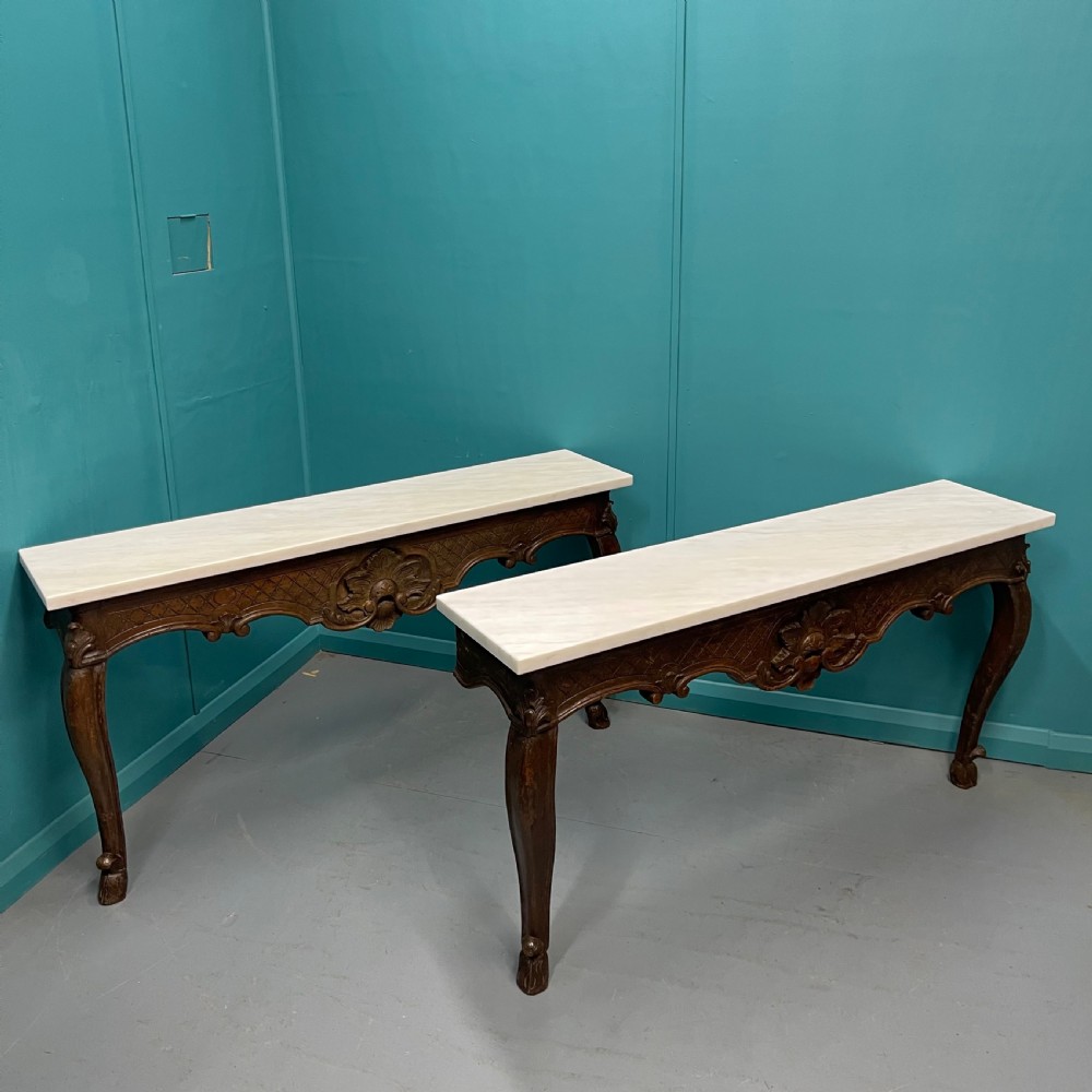 Pair of French marble top wall mounted console tables 