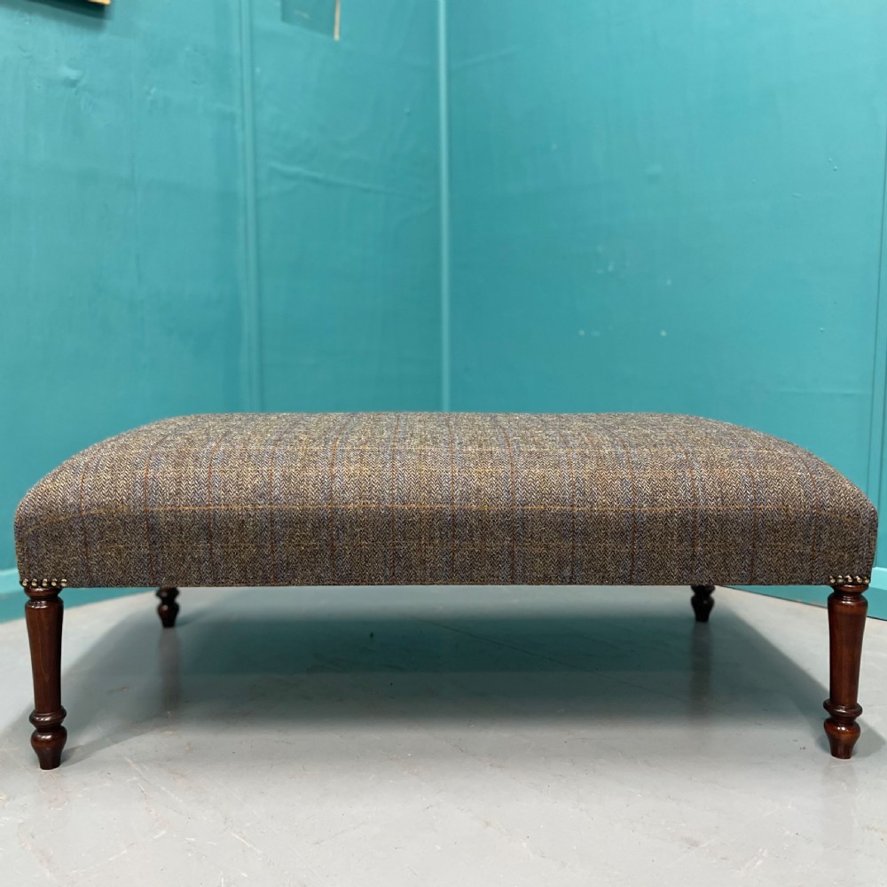 Newly upholstered Harris Tweed ottoman footstool