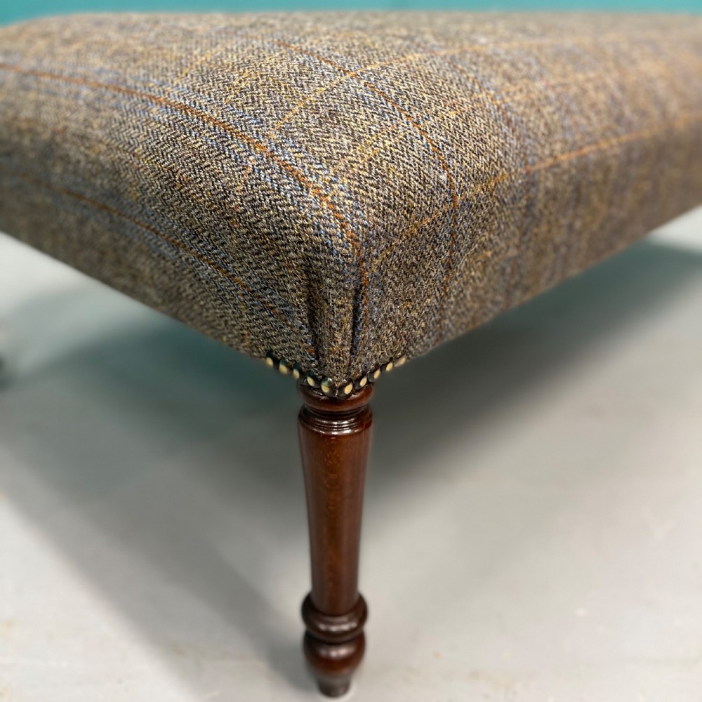 Newly upholstered Harris Tweed ottoman footstool View III