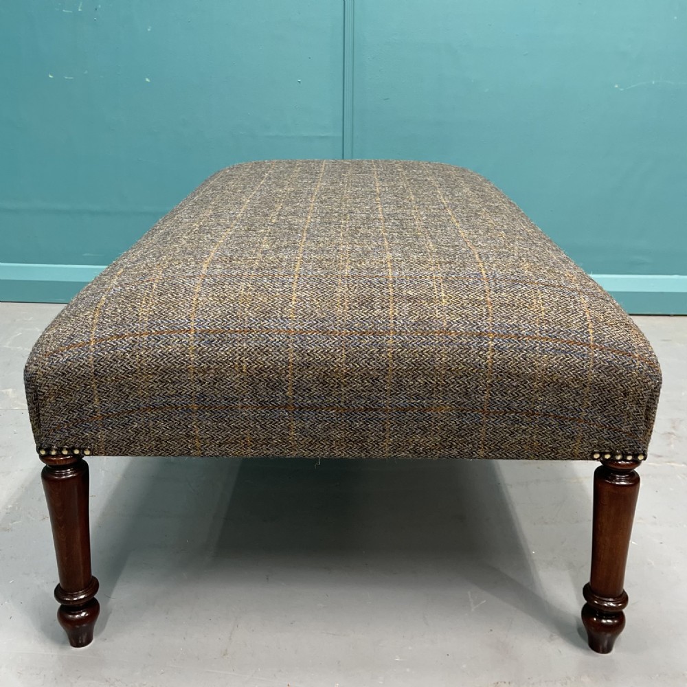 Newly upholstered Harris Tweed ottoman footstool View V