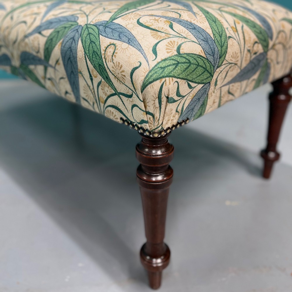 Newly upholstered Victorian ottoman footstool View III