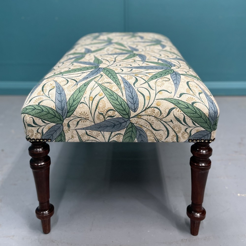 Newly upholstered Victorian ottoman footstool View V