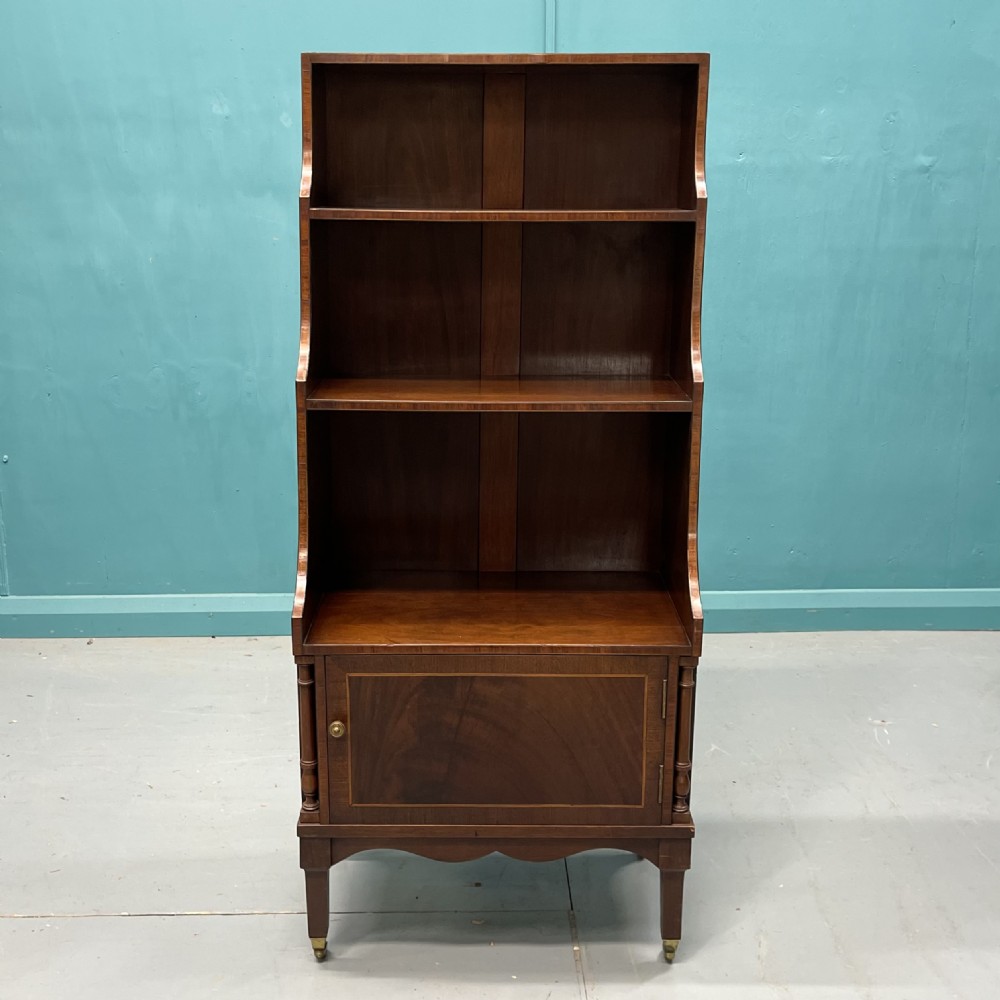 Slim Regency style waterfall bookcase