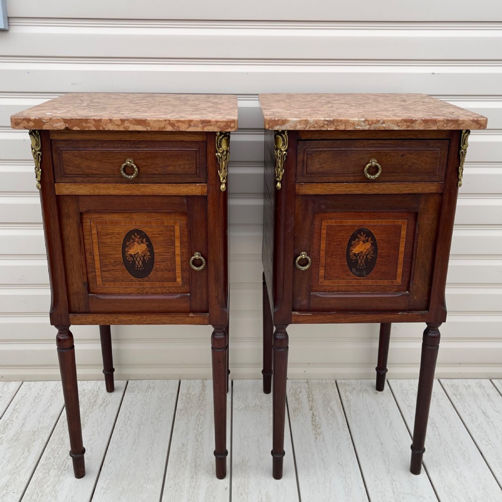 Pair of French marble top bedside cabinets
