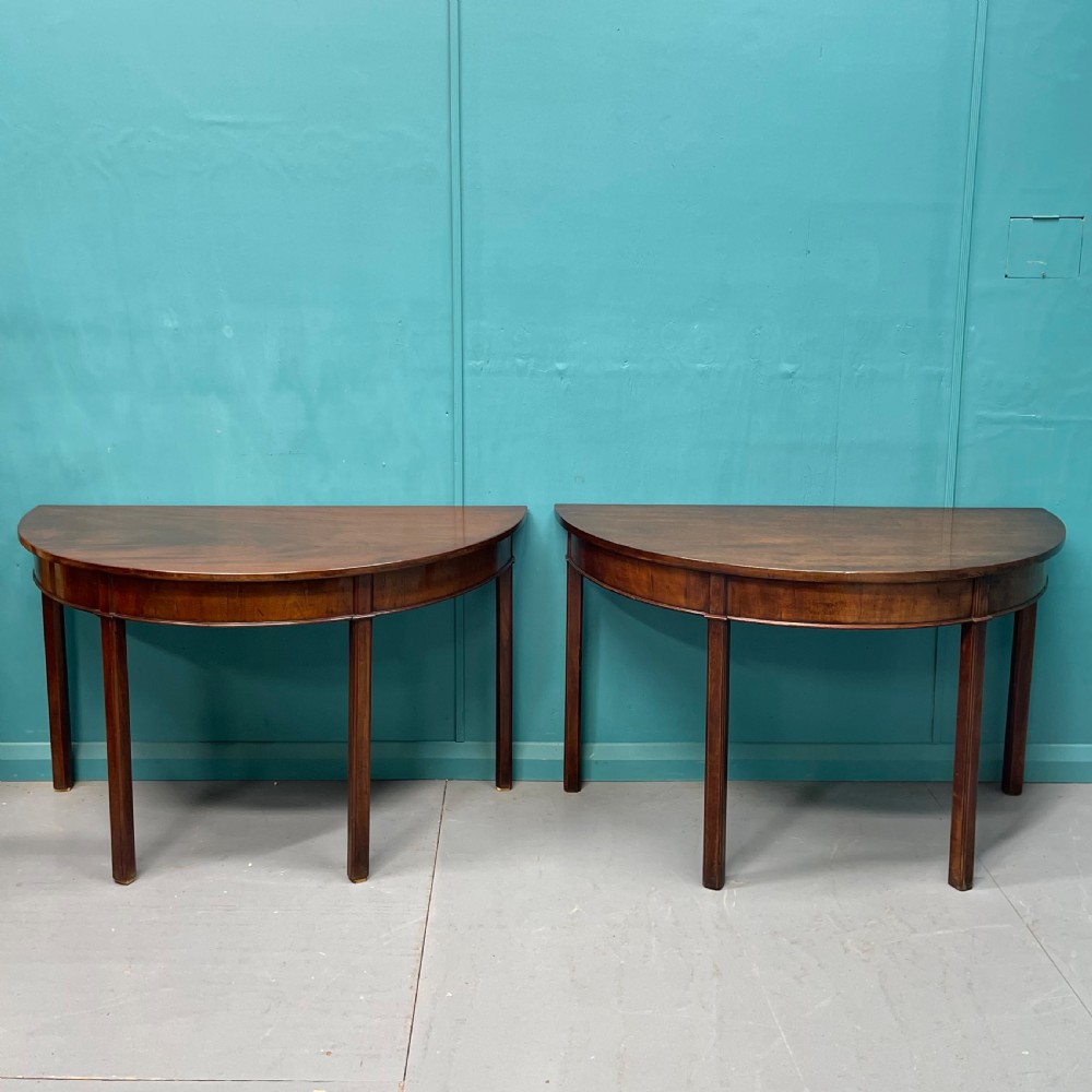 Pair of Georgian demi lune console tables