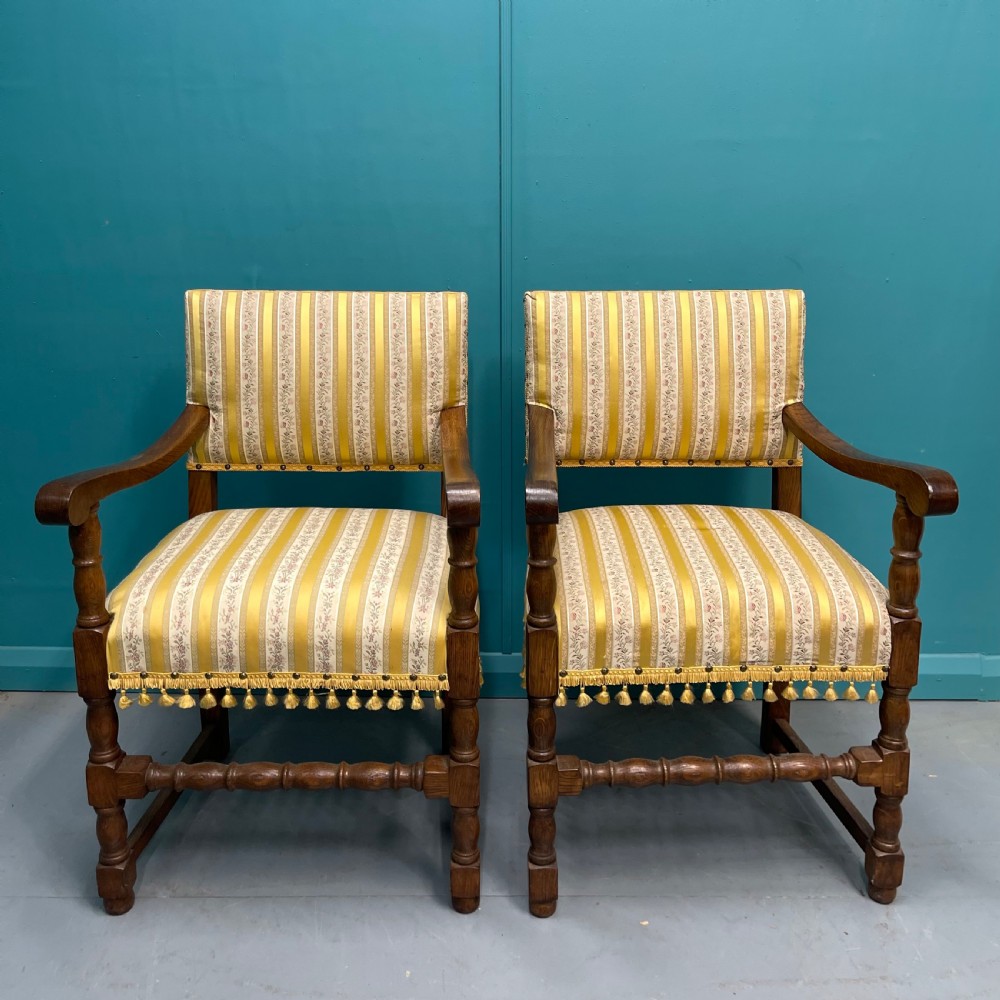 Pair of English oak hall armchairs