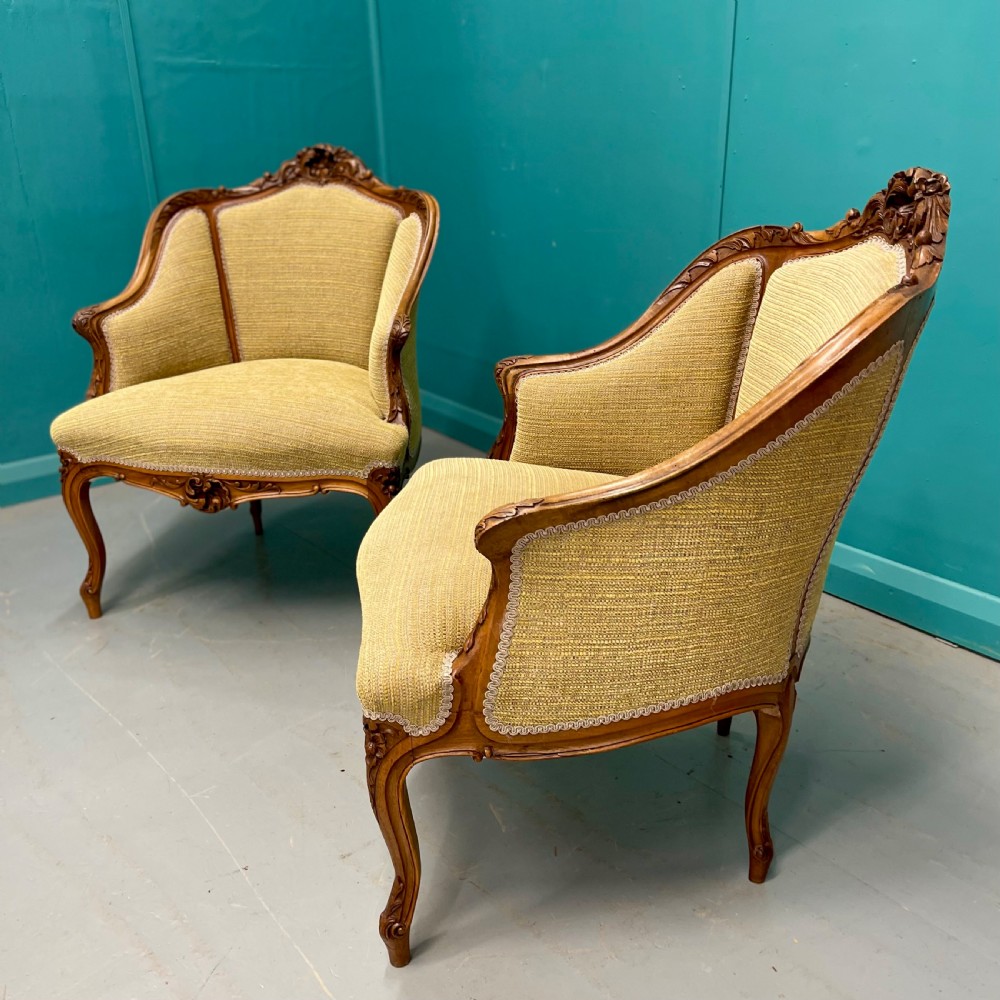 Pair of French walnut low back tub armchairs View II