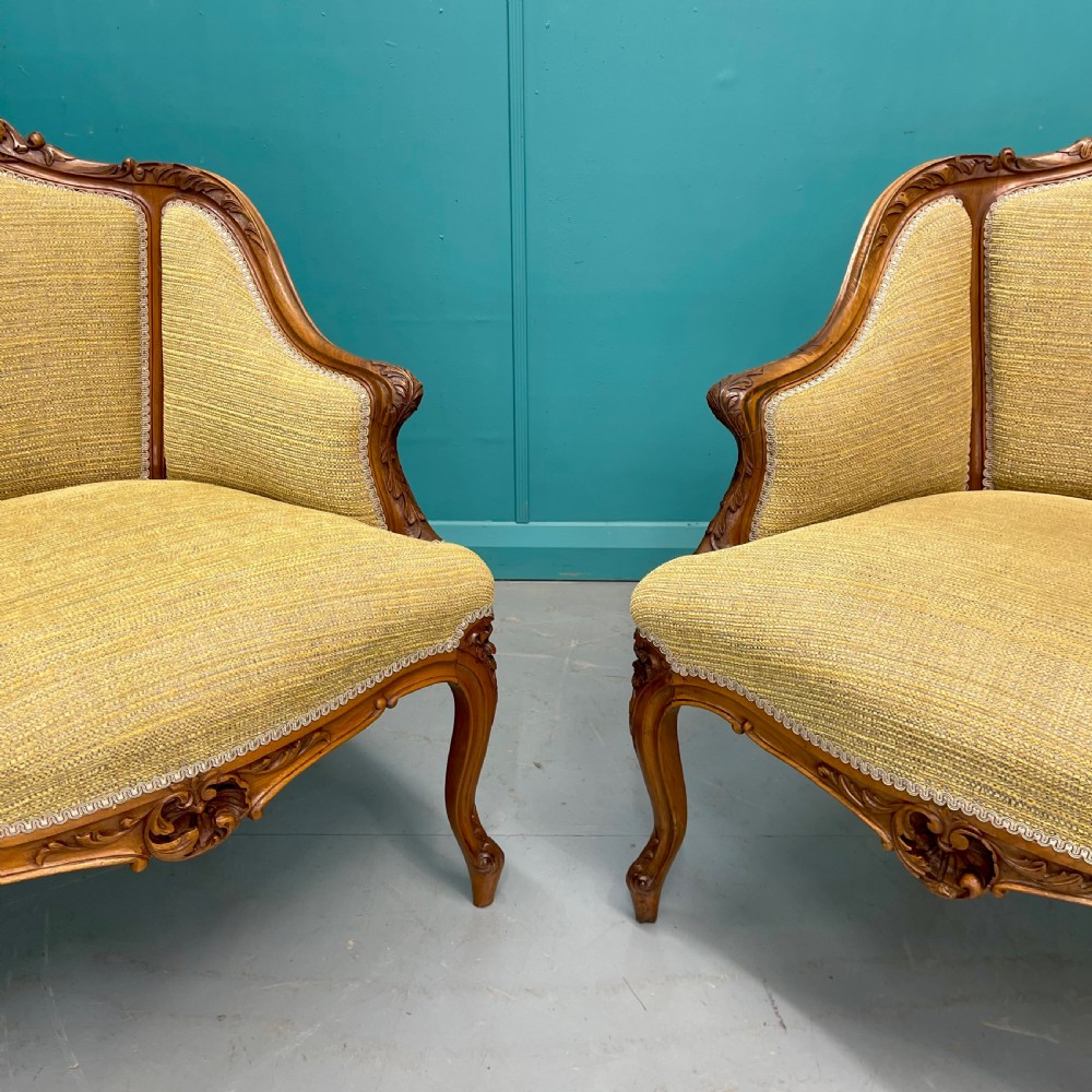 Pair of French walnut low back tub armchairs View V