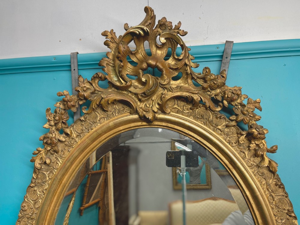 Large French oval gilt mirror with bevelled glass View III