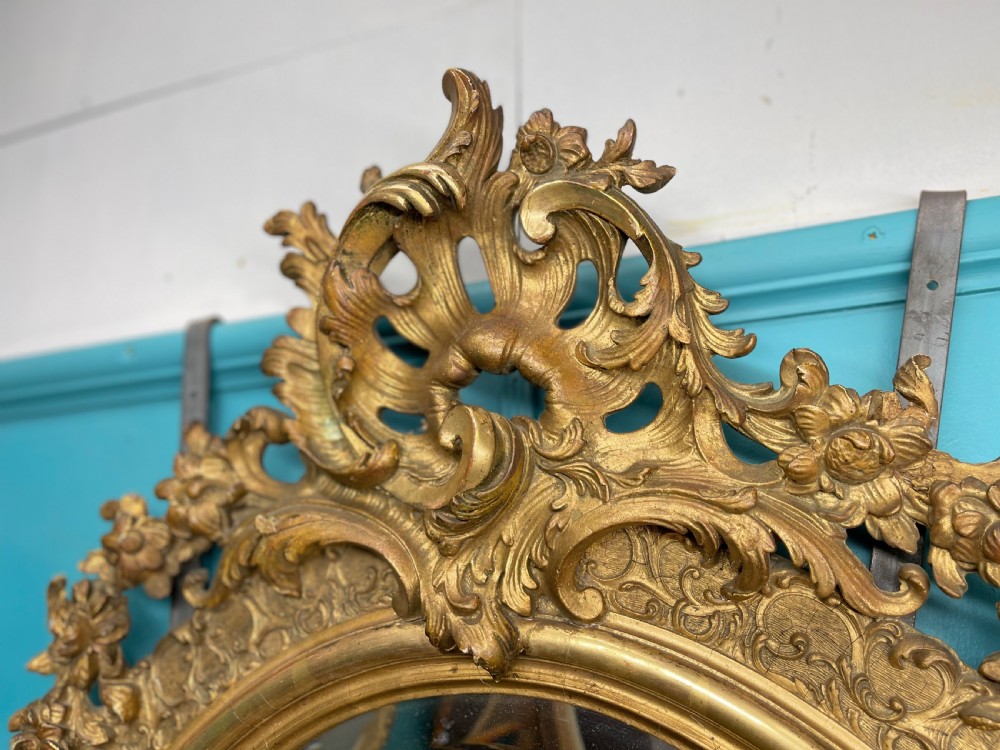 Large French oval gilt mirror with bevelled glass View VI