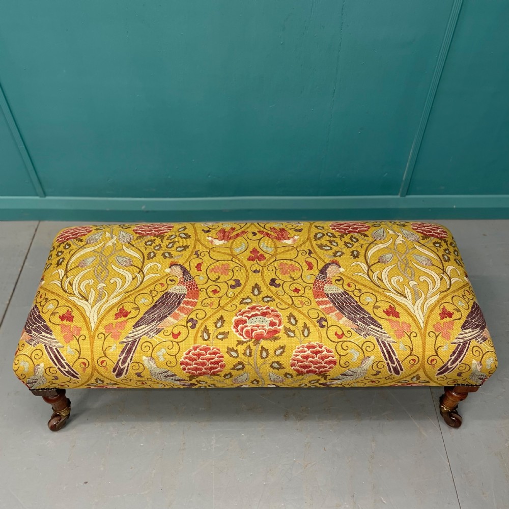 Victorian oak low footstool on castors  View III