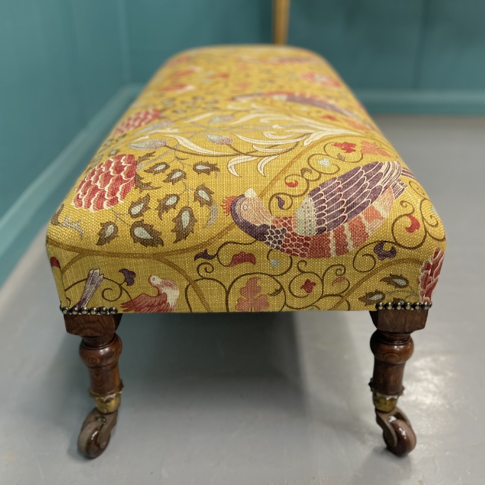 Victorian oak low footstool on castors  View IV