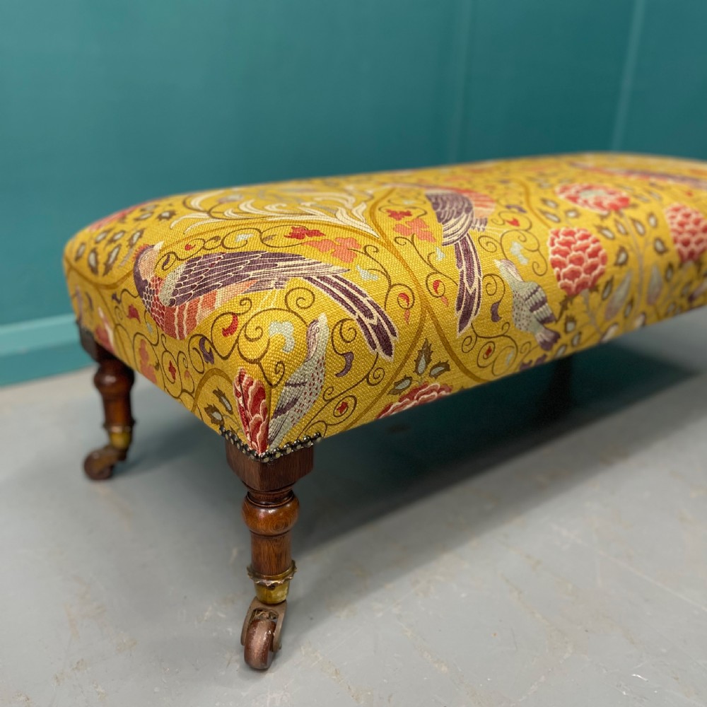 Victorian oak low footstool on castors  View V