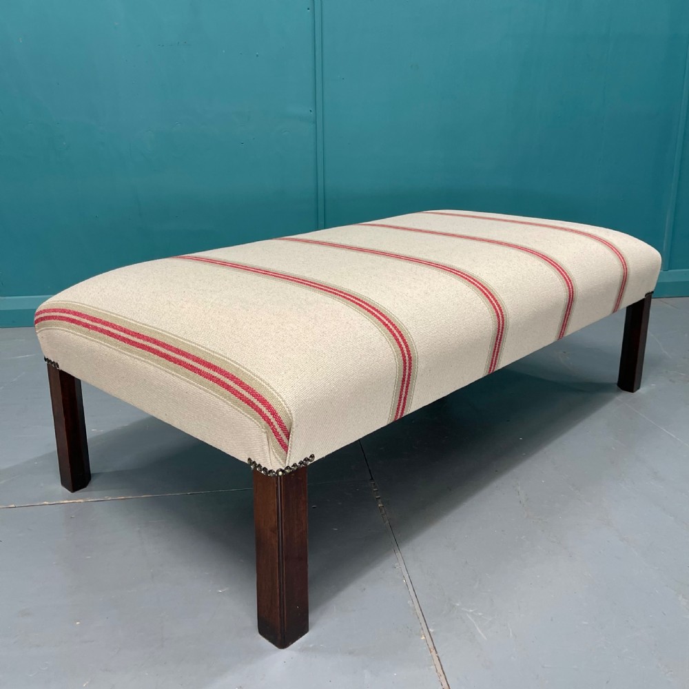 Newly upholstered heavy ticking stripe footstool View II