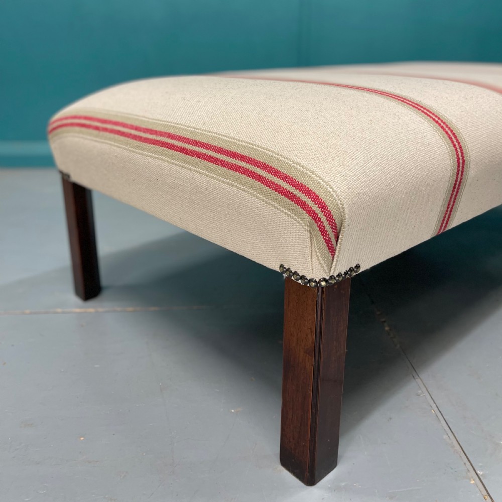 Newly upholstered heavy ticking stripe footstool View IV
