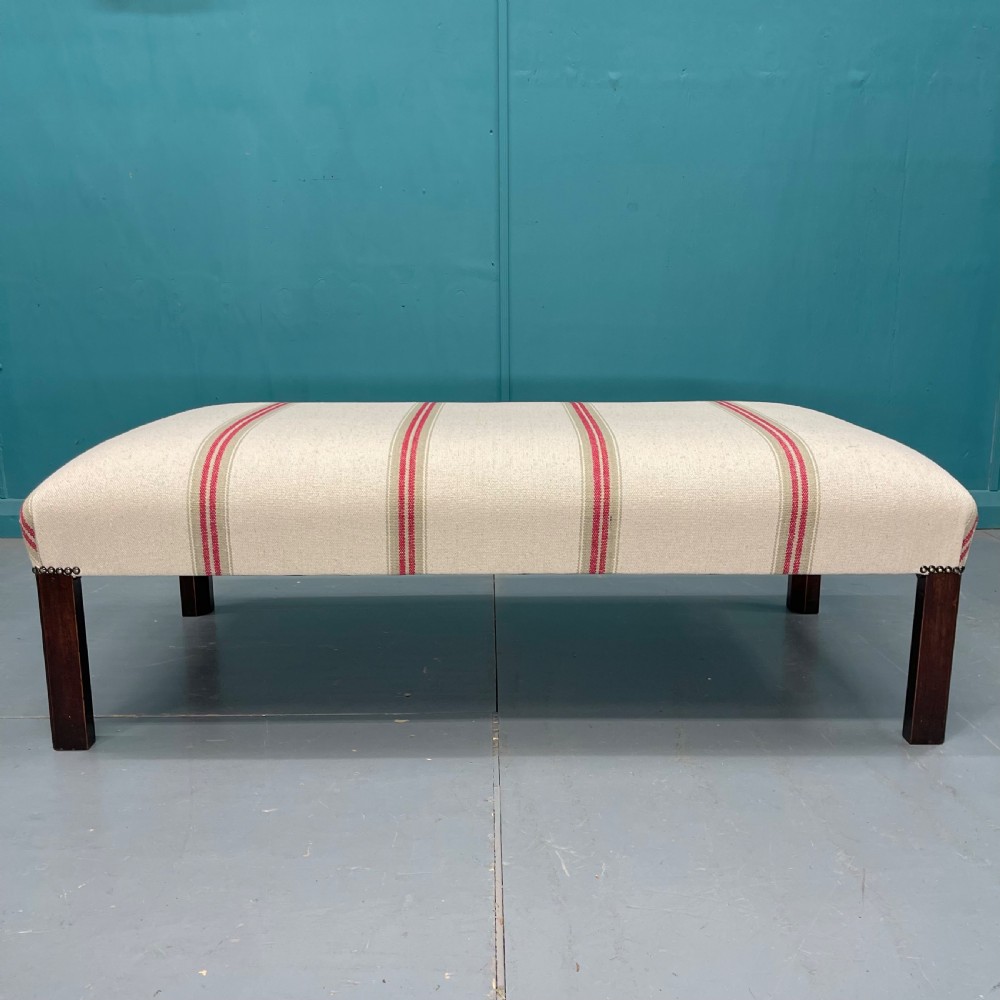 Newly upholstered heavy ticking stripe footstool View V