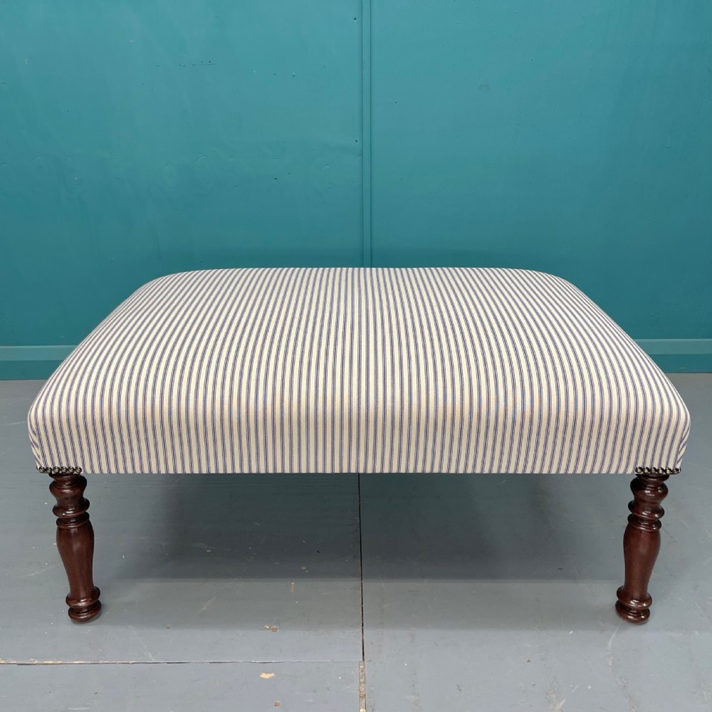 Newly upholstered blue ticking stripe footstool View VI