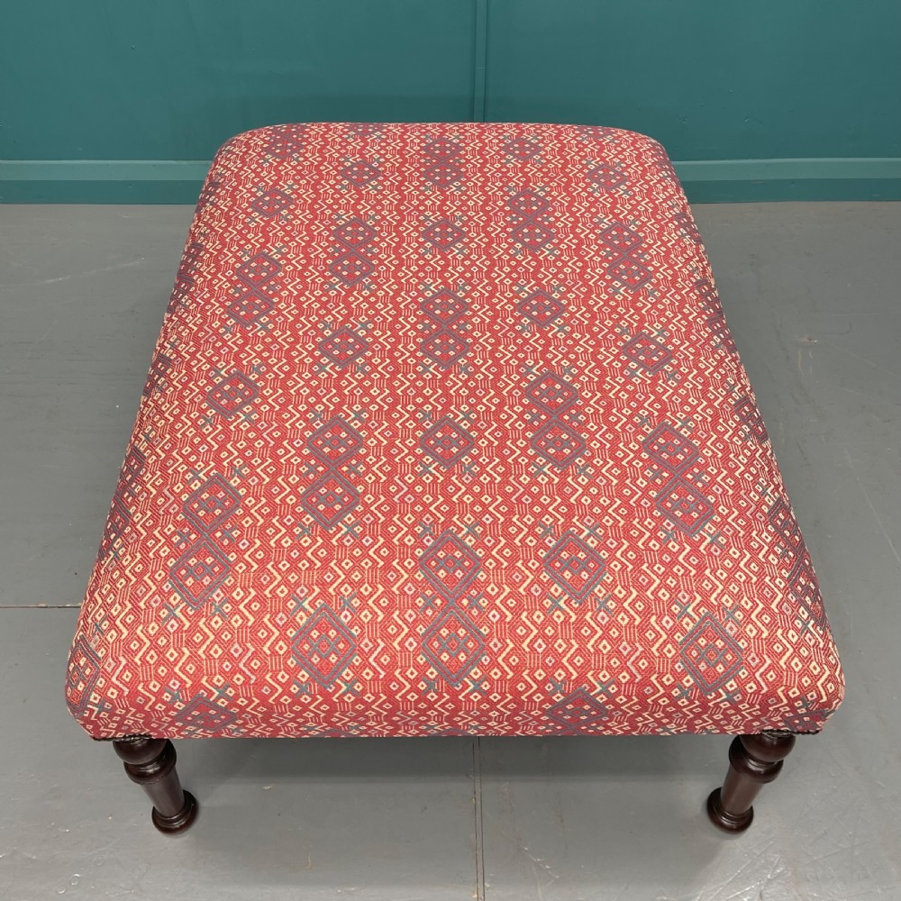 Large newly upholstered geometric print footstool View V