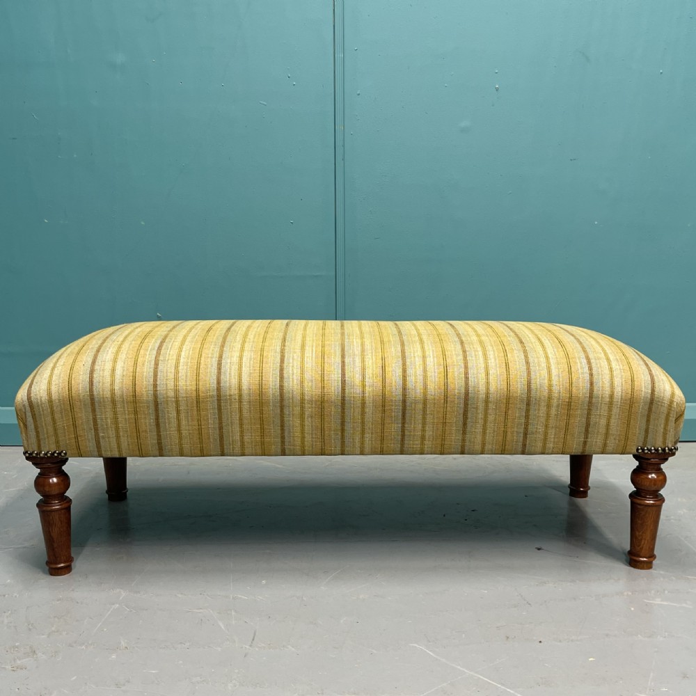Newly upholstered retro stripes ottoman footstool