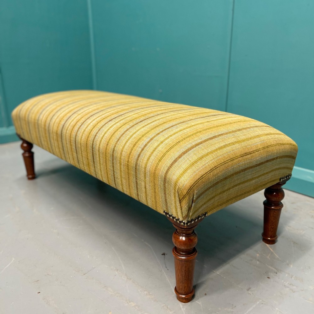 Newly upholstered retro stripes ottoman footstool View II