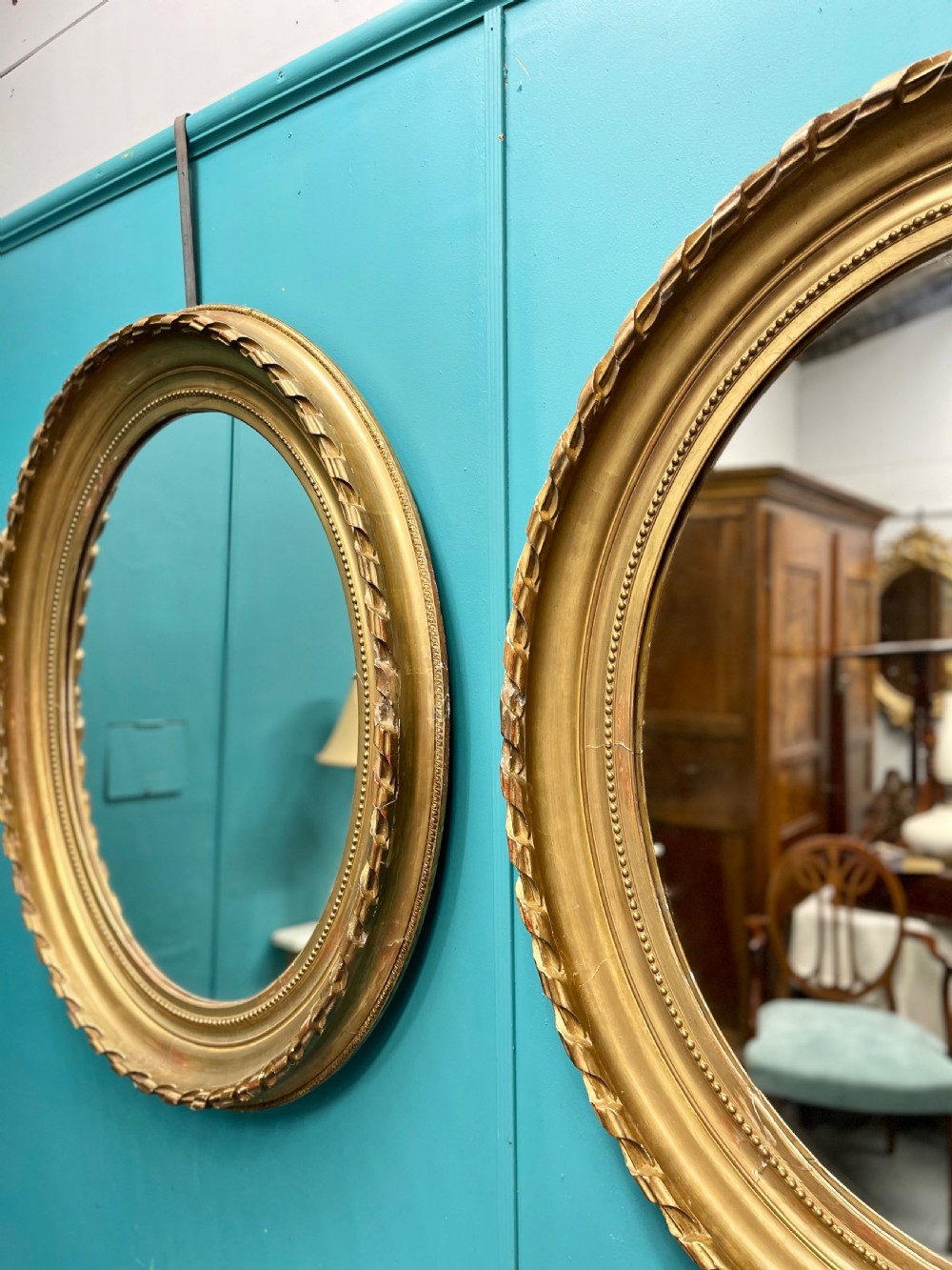 Large pair of French oval gilt mirrors View III