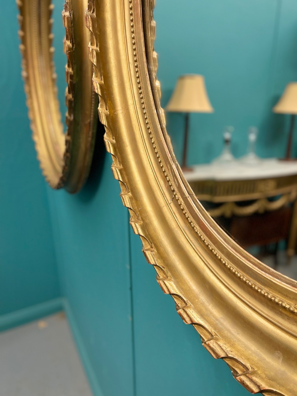 Large pair of French oval gilt mirrors View IV