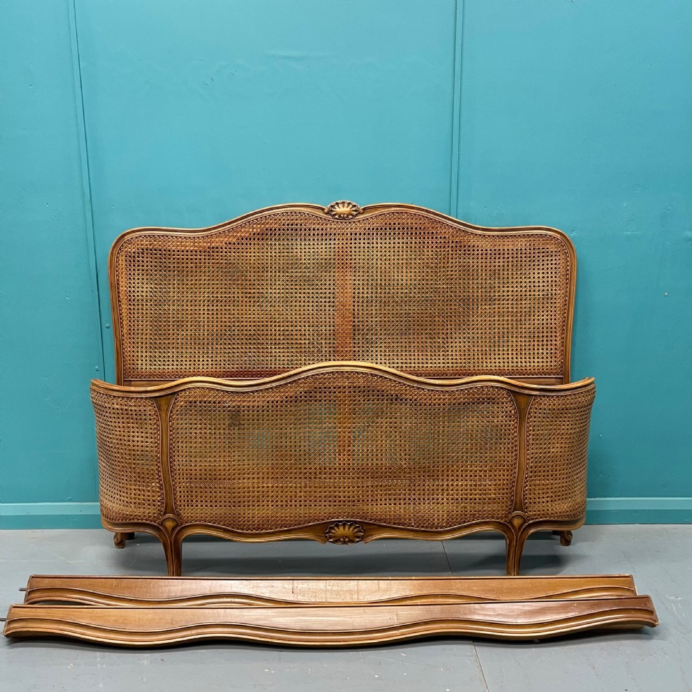 French kingsize 5’ cane bed with supporting base inc. View VII