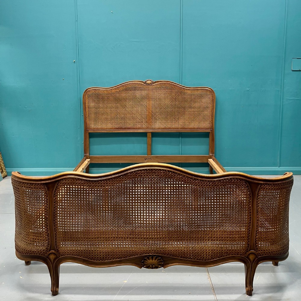 French kingsize 5’ cane bed with supporting base inc. View IX