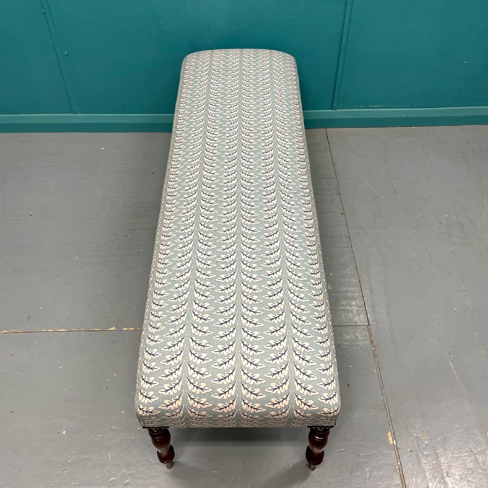 Newly upholstered leaf motif long stool View V