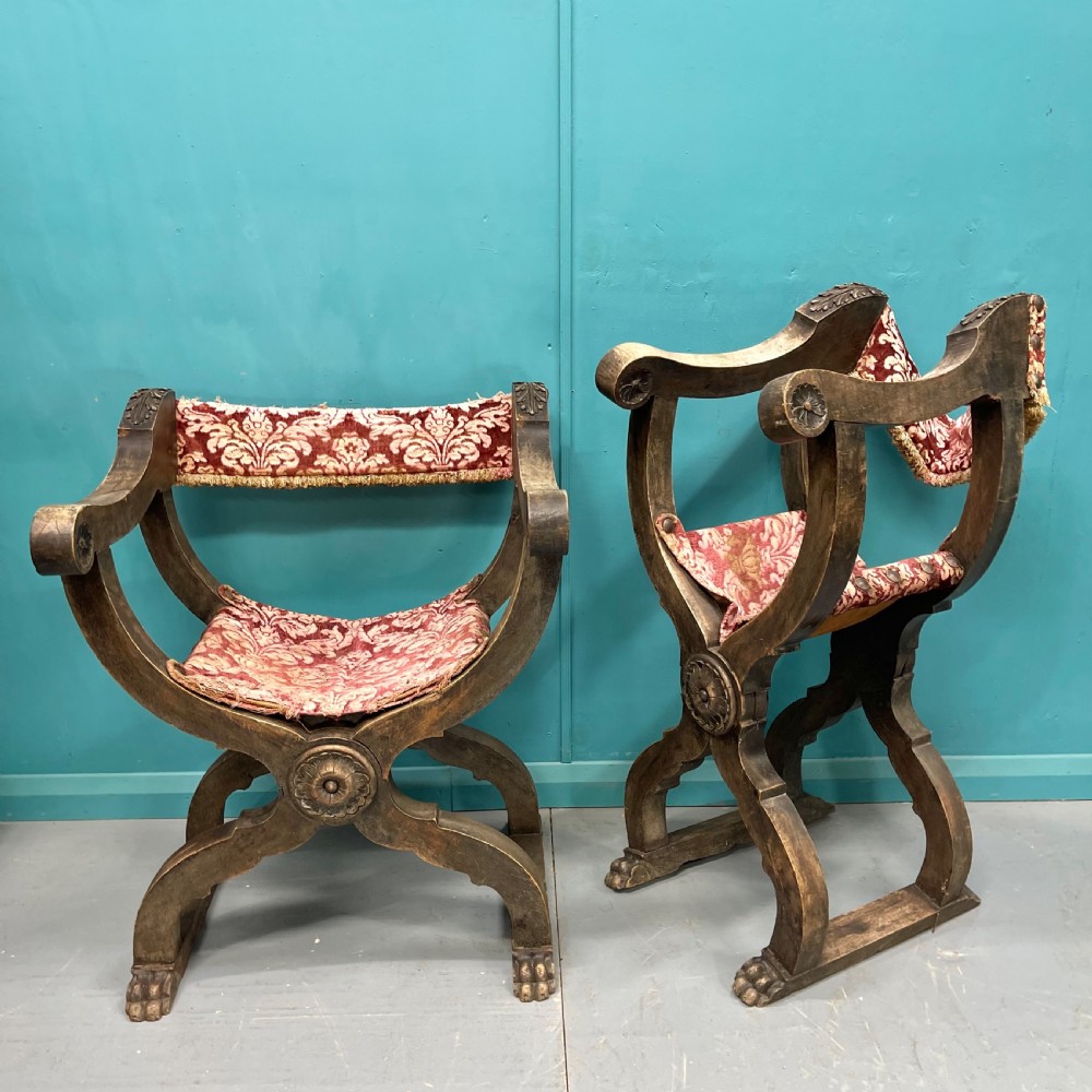 Pair of Spanish X frame hip joint hall chairs View II