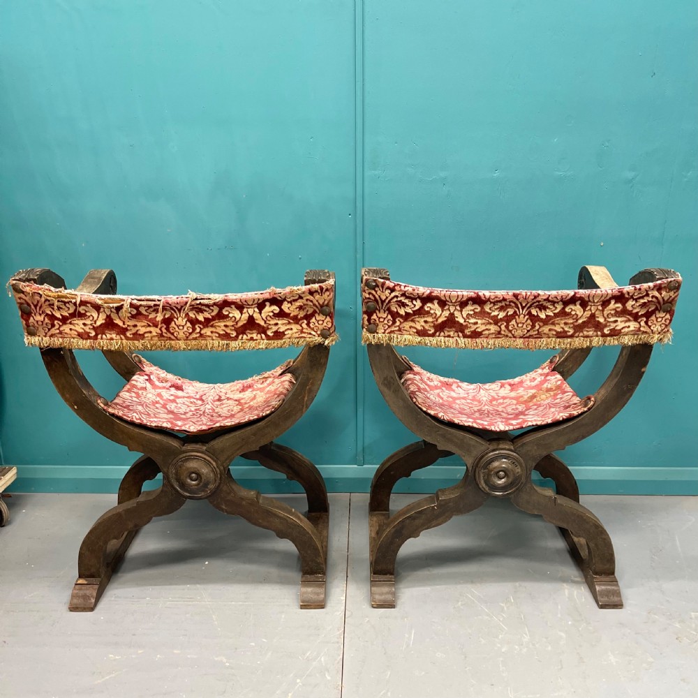 Pair of Spanish X frame hip joint hall chairs View X