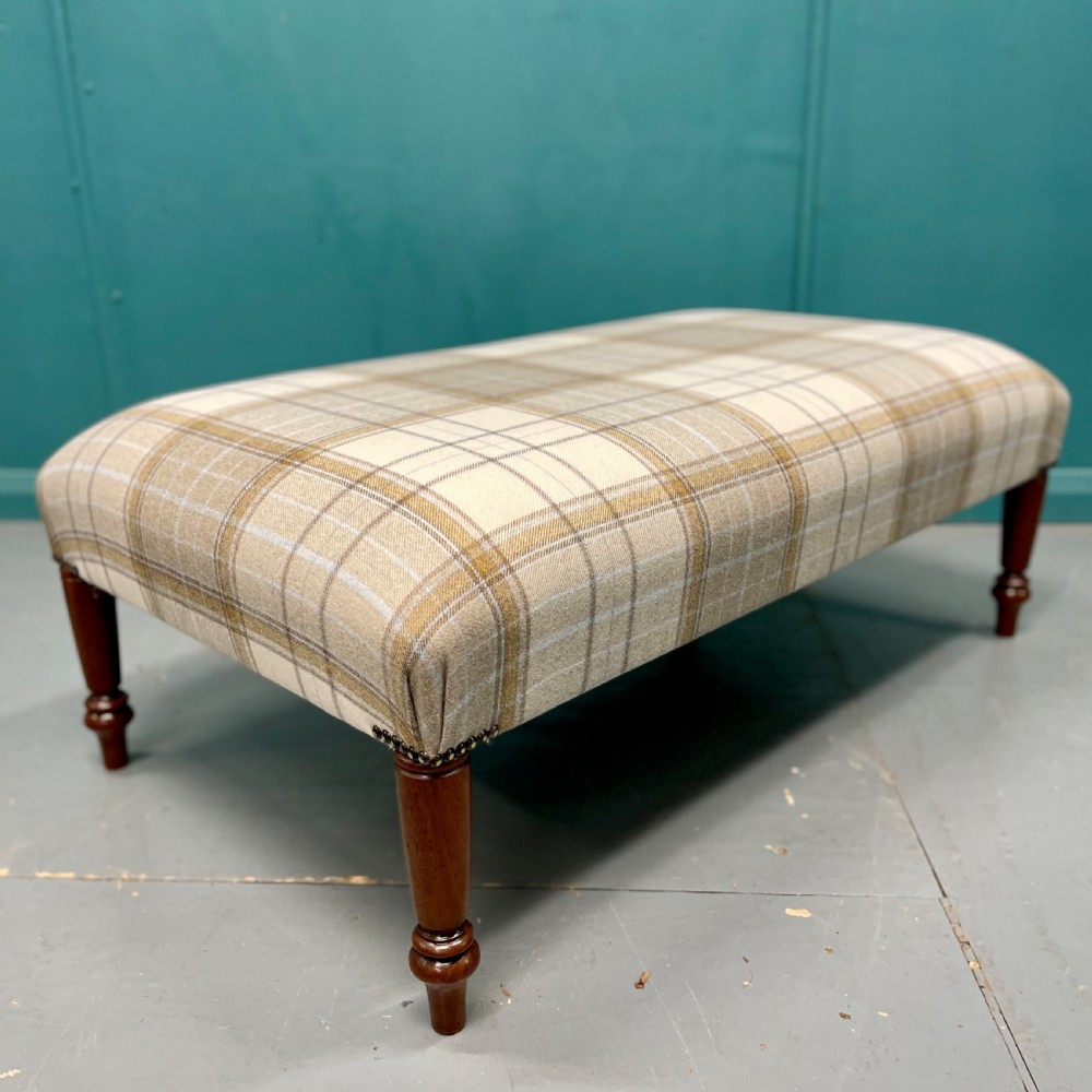 Newly upholstered Harris tartan plaid footstool View II