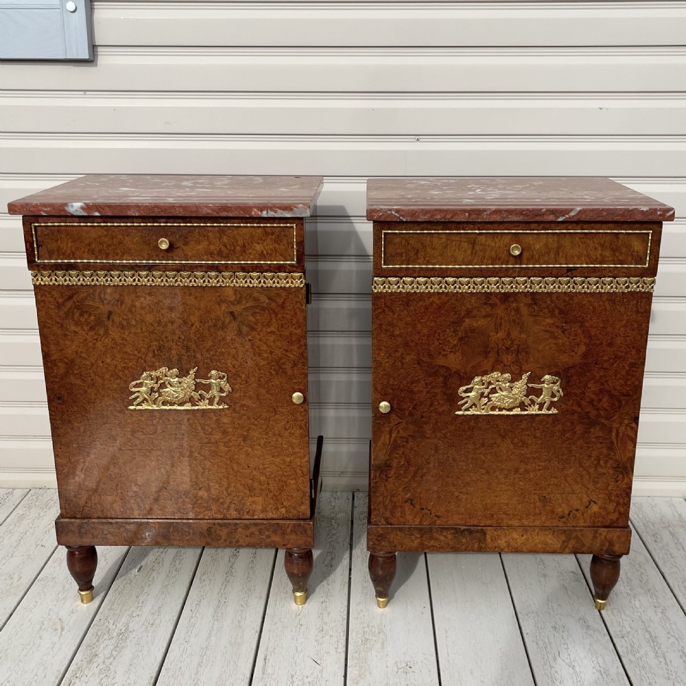 Pair of French Empire style burr walnut bedside cabinets 
