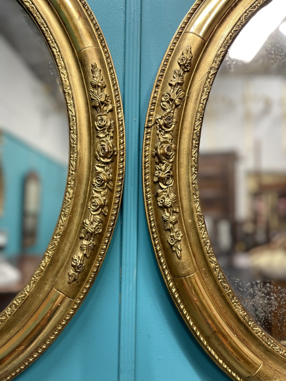 Large pair of French oval gilt mirrors View II