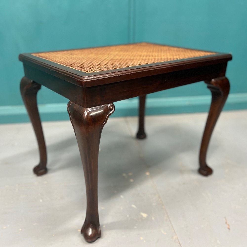 Edwardian mahogany and cane dressing table stool